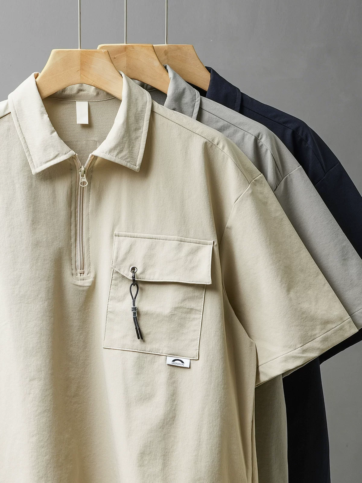 Áo thun polo công sở OMZM chất liệu vải lụa đá nhanh khô, tay ngắn, kiểu dáng mùa hè dành cho nam, phong cách leo núi, giả hai mảnh, cổ nửa khóa kéo, tay lửng