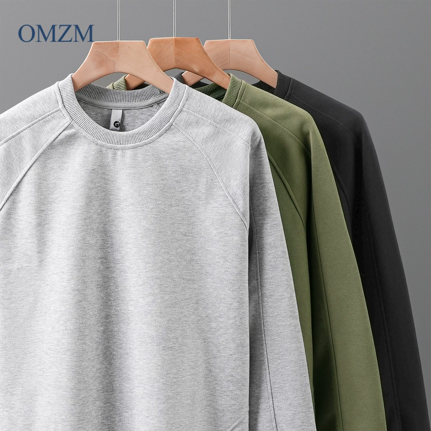 Áo nỉ chắp vá hạng nặng OMZM320G dành cho nam, thiết kế mùa thu kiểu Mỹ, áo chui đầu cổ tròn dài tay màu trơn được thiết kế theo phong cách deconstructed