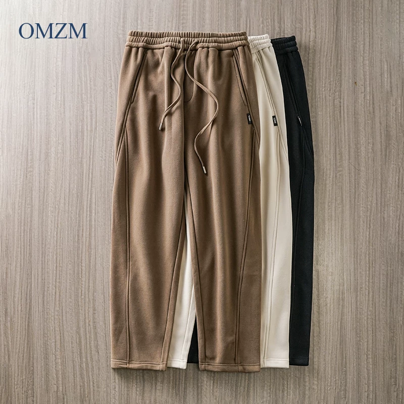 Quần thể thao nam OMZM460G lót lông cừu dày dặn, giữ ấm mùa đông, kiểu dáng thể thao, quần ống rộng, dáng suông.