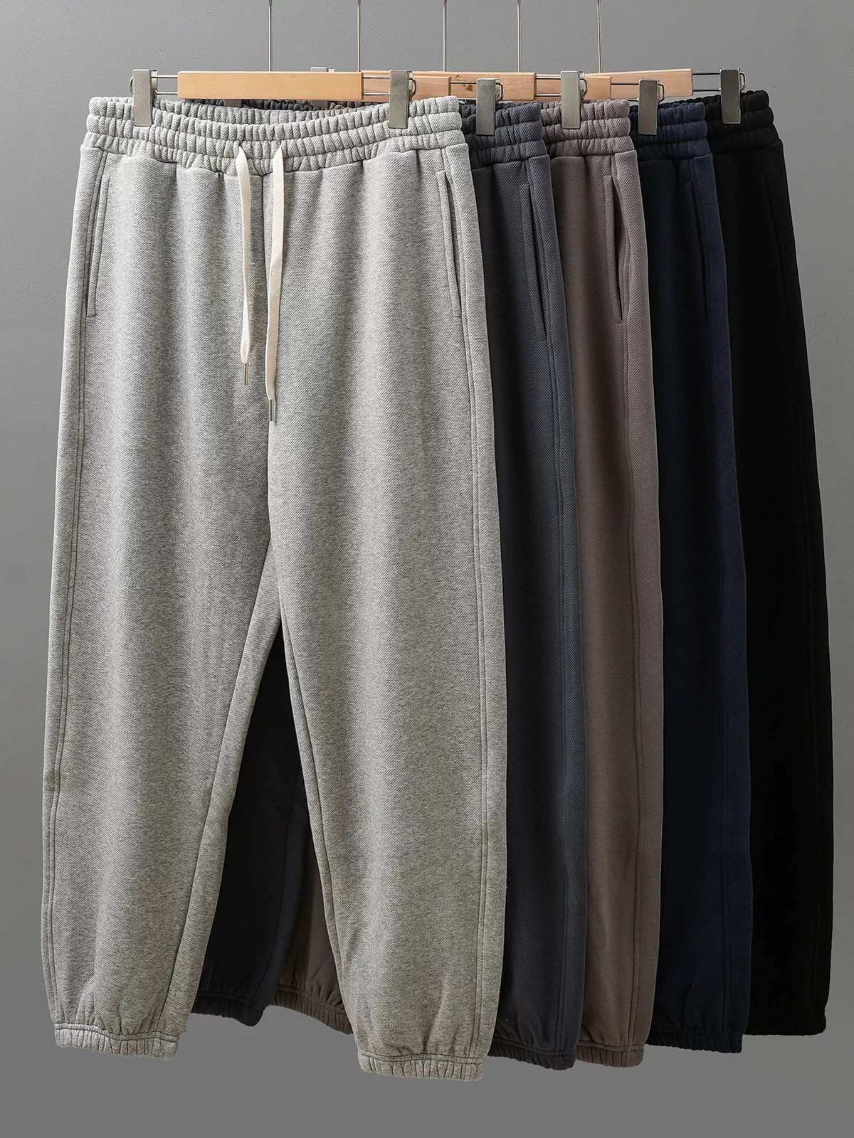 Quần jogger lót lông cừu OMZM dành cho nam, quần dày ấm mùa đông mới, quần thể thao dệt kim dáng rộng phong cách Mỹ.