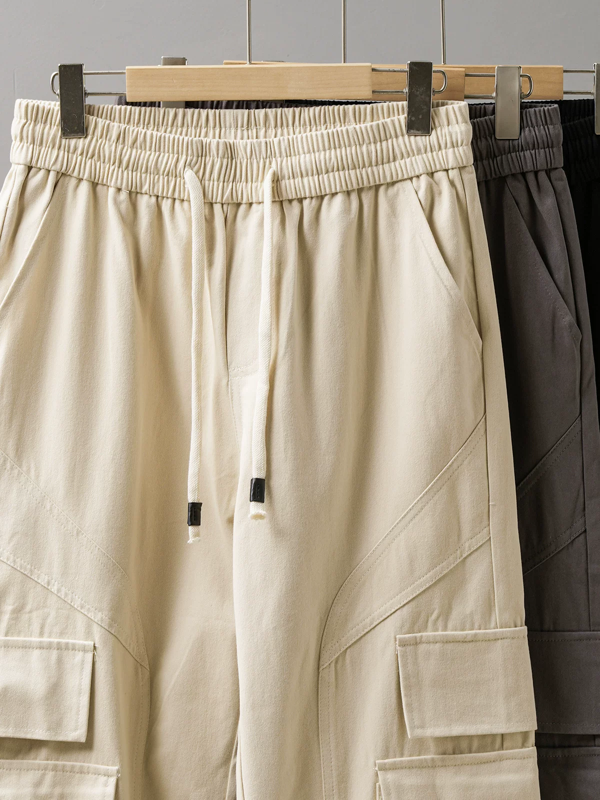 Quần cargo cotton dày dặn kiểu Mỹ OMZM dành cho nam, quần thường ngày có túi chắp vá mùa hè, quần dài màu trơn rộng rãi, hợp thời trang.