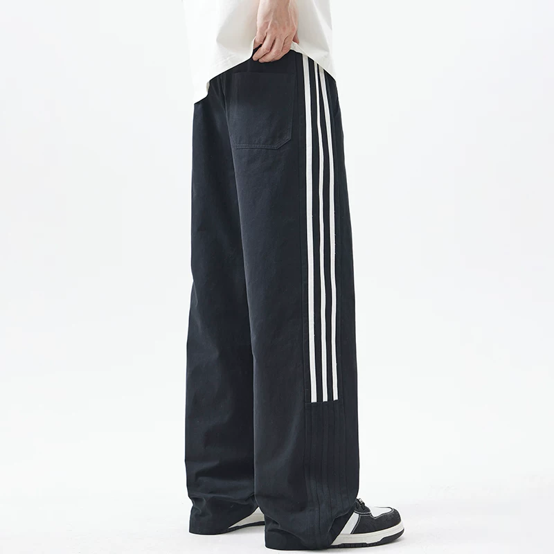 Quần thể thao nam OMZM chất liệu cotton nguyên chất, sọc, kiểu dáng mới xuân 2025, thời trang, dáng thẳng, rộng rãi, thoải mái, dài.