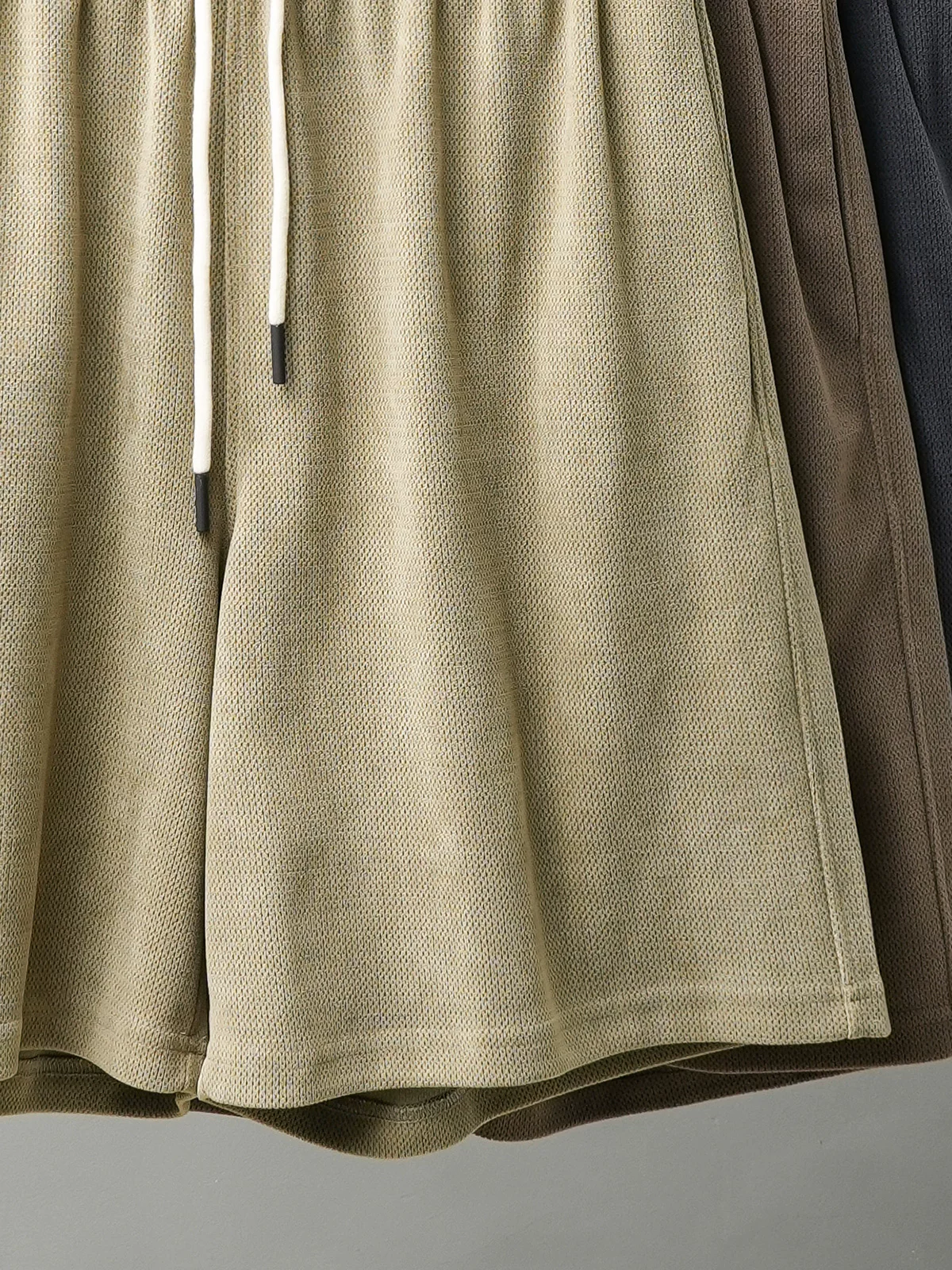 Quần short chenille hạng nặng OMZM dành cho nam, quần short năm điểm kiểu dáng xòe phong cách Mỹ mùa hè, dáng rộng, cỡ lớn, quần thể thao dài vừa phải màu trơn.