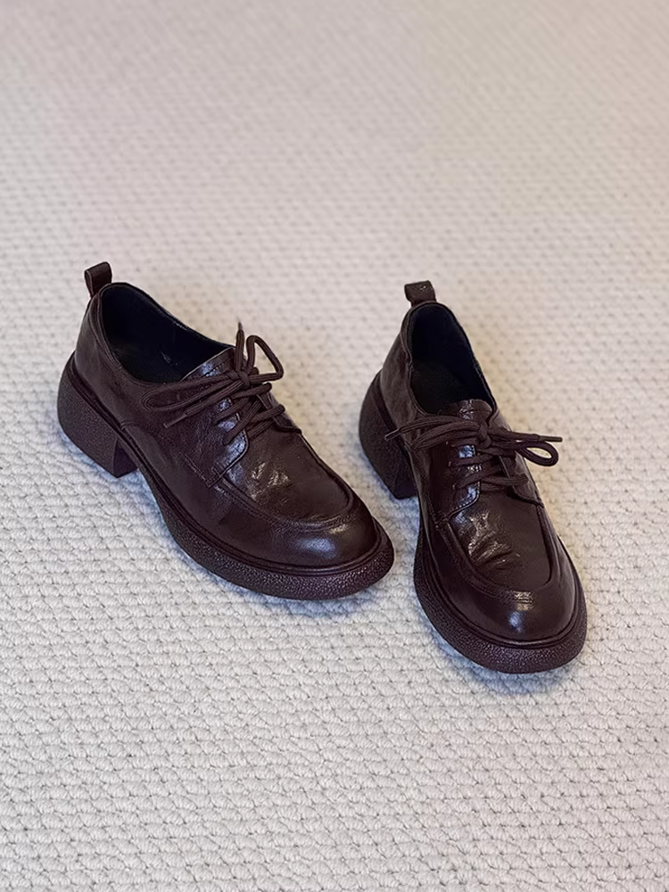 Phiên bản da cừu ~ Giày lười đi làm đế bằng da thật màu đen dành cho nữ, giày lười kiểu cổ điển buộc dây kiểu đại học cắt sâu.