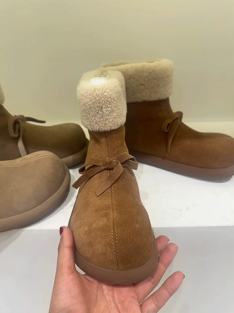 Phiên bản da bò ~ Lông thú tích hợp lớp lót lông cừu, ủng cotton lông ấm áp dành cho nữ, ủng ngắn phong cách cổ điển có nơ, ủng chống trượt đi tuyết.