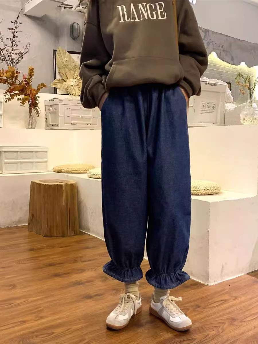 Quần ống rộng dáng đèn lồng chất liệu jean co giãn, màu trơn, kiểu xếp ly, phong cách mới Xuân 2025, dành cho nữ