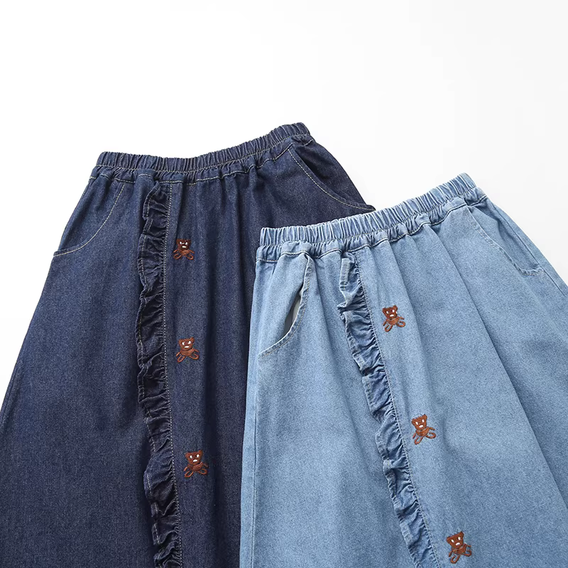 Váy denim dáng A xếp ly thêu hình gấu phong cách mới Xuân 2024 Dream Box dành cho nữ