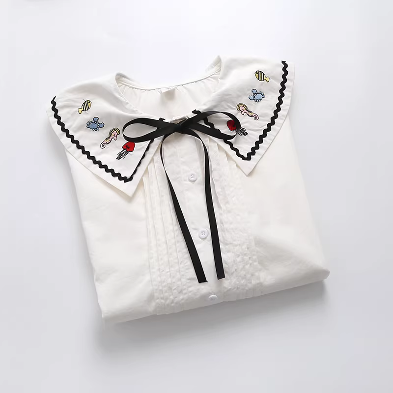 Áo sơ mi cotton thêu hình động vật biển phong cách mới Thu 2021 Dream Box, cổ búp bê, tay dài, dáng rộng, màu trắng dành cho nữ