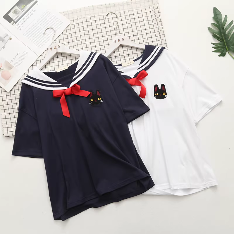 Áo thun nữ cotton dáng rộng tay ngắn cổ bẻ nơ thêu hình mèo mùa hè mới Dream Box 2024