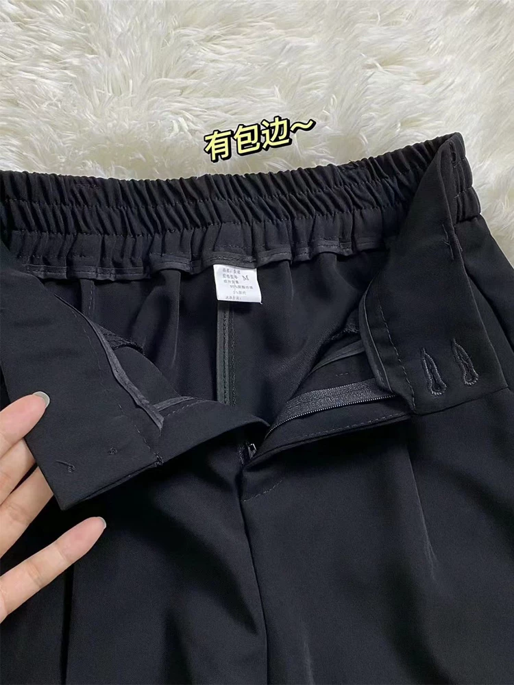 Quần âu đen, kiểu dáng xuông rộng, cạp cao, che hông, chất liệu mềm mại, tôn dáng, dành cho nữ, size lớn, thích hợp cho mùa hè và đầu thu.