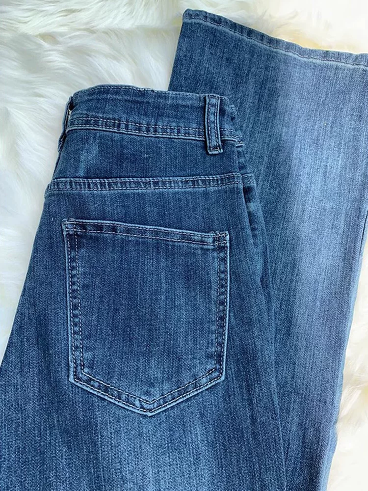 Quần jean ống loe màu xanh cổ điển dành cho nữ, kiểu dáng thu đông mới, cỡ lớn, lưng cao, co giãn, che hông, quần ống loe tôn dáng.
