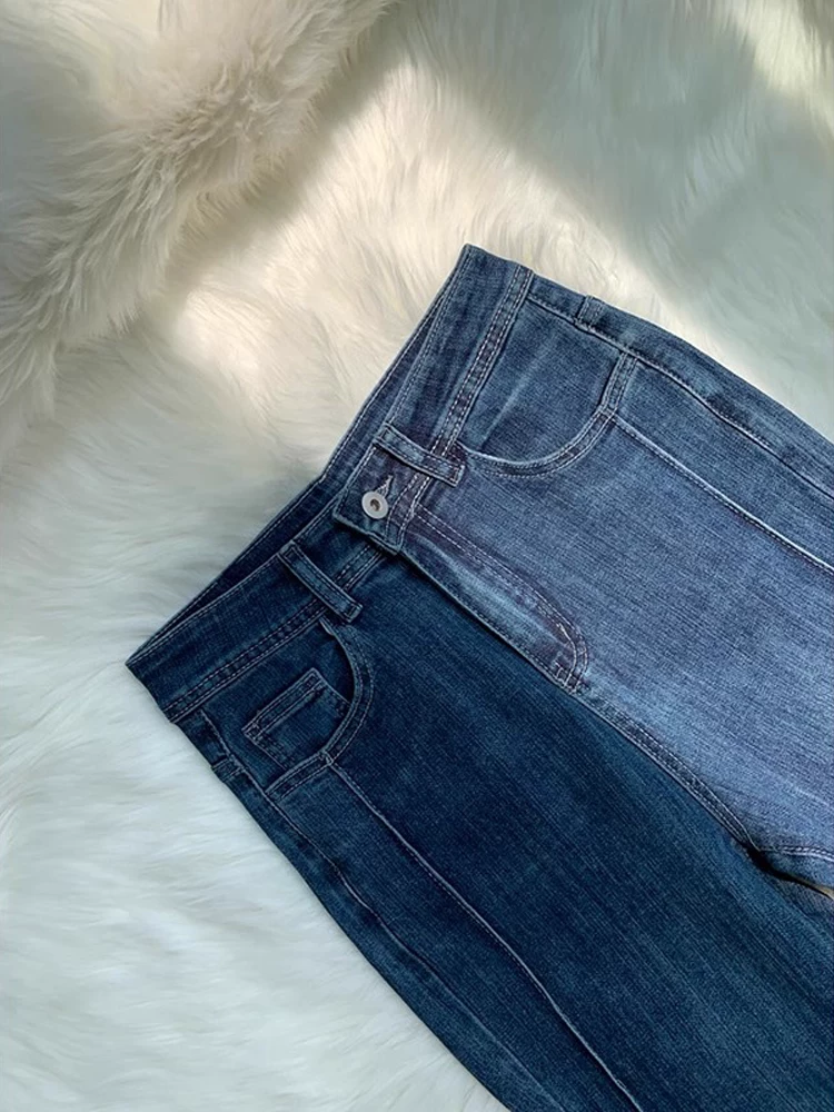 Quần jean ống loe màu xanh cổ điển dành cho nữ, kiểu dáng thu đông mới, cỡ lớn, lưng cao, co giãn, che hông, quần ống loe tôn dáng.