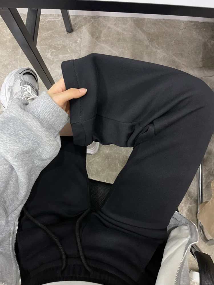 Quần ống loe dày lót lông cừu màu đen dành cho nữ, mùa thu đông, cỡ lớn, lưng cao, mềm mại, che hông, giảm béo, quần thể thao thông thường.