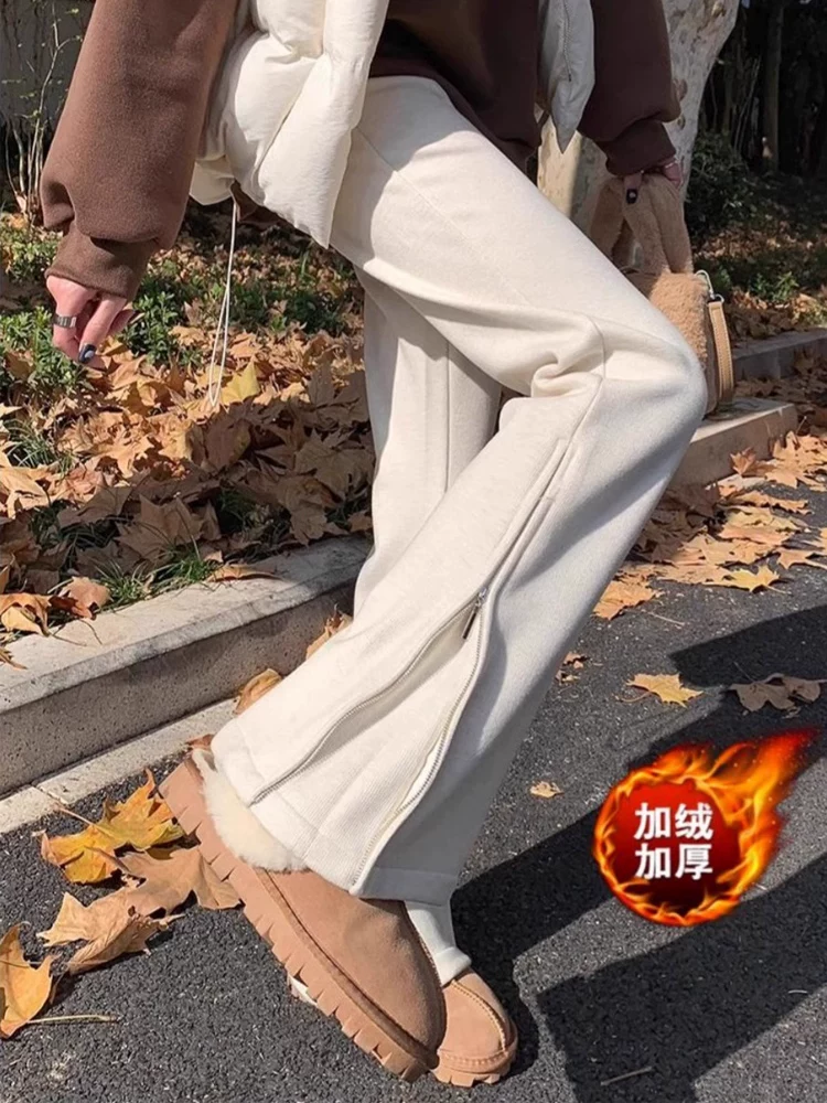 Quần ống loe dày lót lông cừu màu trắng nhạt dành cho nữ, mùa thu đông, cỡ lớn, lưng cao, dáng suôn, che hông, quần ống chuông giúp thon gọn.