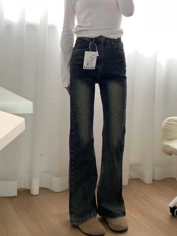 Quần jean ống loe màu xanh cổ điển dành cho nữ, kiểu dáng mùa xuân mới, cỡ lớn, cạp cao, co giãn, che hông, quần ống loe tôn dáng.