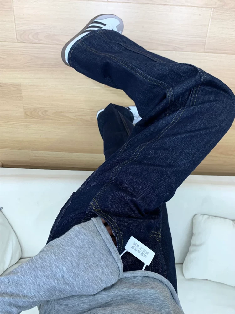 Quần jean nữ màu xanh đậm, dáng thẳng ôm dáng, kiểu mới thu đông 2025, size lớn, cạp cao, che hông, quần ống rộng tôn dáng.