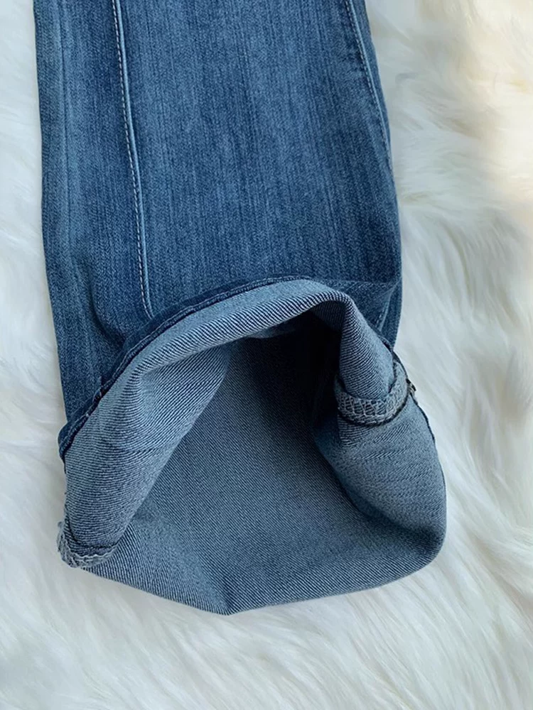 Quần jean ống loe màu xanh cổ điển dành cho nữ, kiểu dáng thu đông mới, cỡ lớn, lưng cao, co giãn, che hông, quần ống loe tôn dáng.