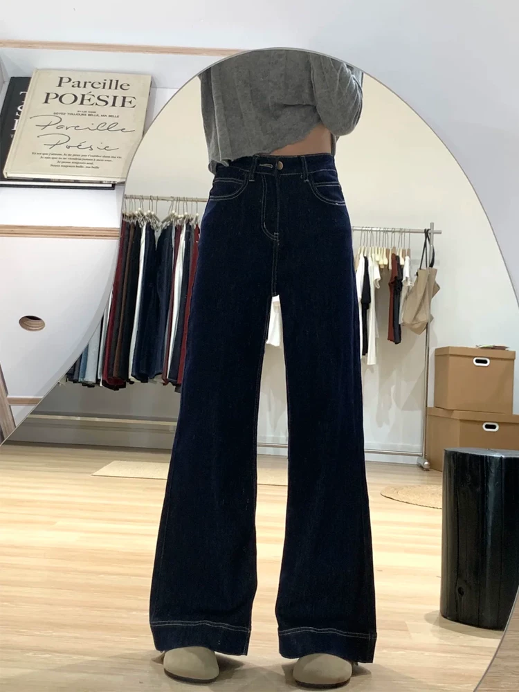 Quần jeans xanh denim dáng loe nữ xuân 2025 kiểu mới, size lớn, cạp cao, che hông, chất liệu mềm mại, tôn dáng, kiểu chuông