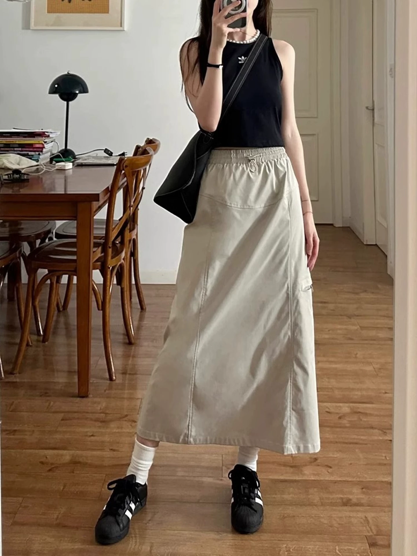 Váy công sở cổ điển kiểu Mỹ dành cho nữ, phong cách mùa hè mới, cỡ lớn, lưng cao, che hông, giảm béo, váy chữ A dài vừa phải.