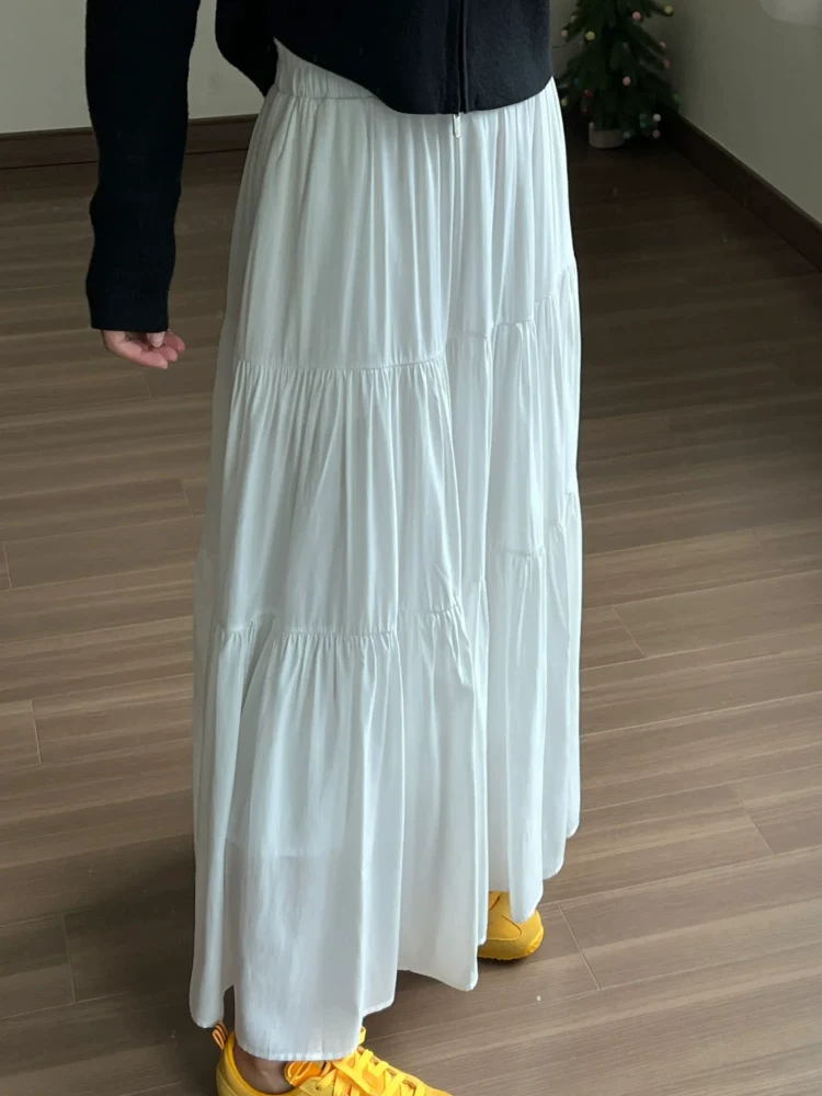 Váy trắng nửa thân cho nữ, hè 2025, size lớn, cạp cao, dáng chữ A xếp tầng, dài ngang đùi, kiểu xòe bồng bềnh.