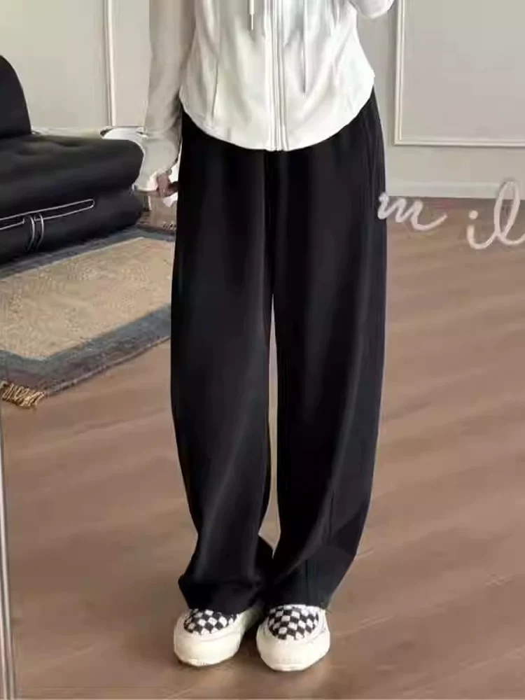 Quần âu nữ ống rộng màu đen, mùa thu đông 2025, lót lông cừu, size lớn, cạp cao, dáng rộng, tôn dáng, quần thể thao ống rộng.