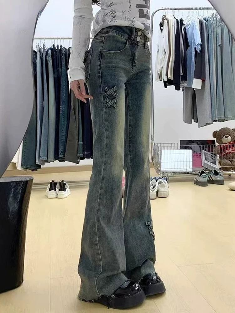 Quần jeans nữ dáng xòe nơ thời trang hè 2025, size lớn, cạp cao, co giãn, che hông, tôn dáng