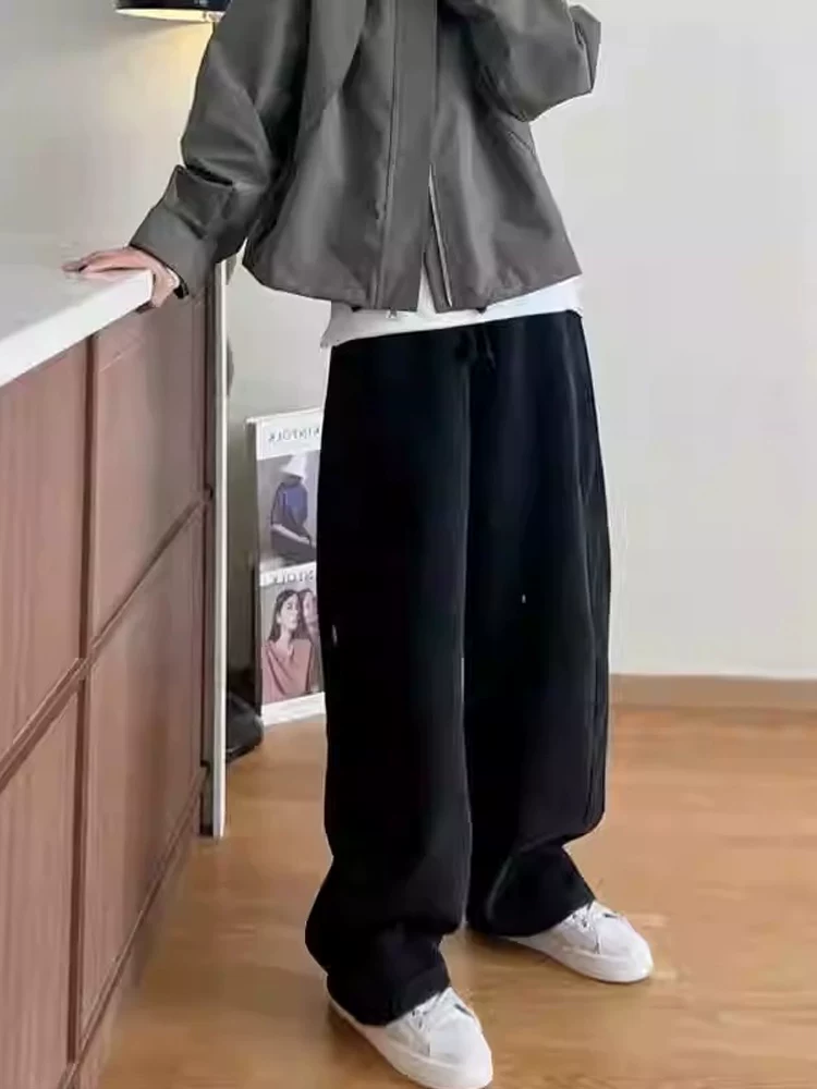 Quần âu nữ ống rộng màu đen, mùa thu đông 2025, lót lông cừu, size lớn, cạp cao, dáng rộng, tôn dáng, quần thể thao ống rộng.