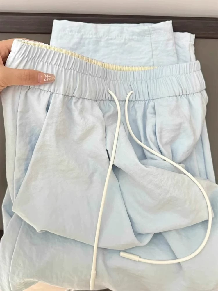 Quần màu xanh sữa dành cho nữ, kiểu dáng mùa hè mới, cỡ lớn, lưng cao, dáng rộng, xếp nếp, thon gọn, chất liệu lụa băng, quần ống rộng thông thường.
