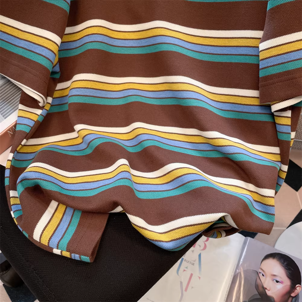 Áo thun nữ tay ngắn kẻ sọc phối màu phong cách đại học Mỹ, kiểu mới hè 2025, áo kiểu dáng năng động, thoải mái