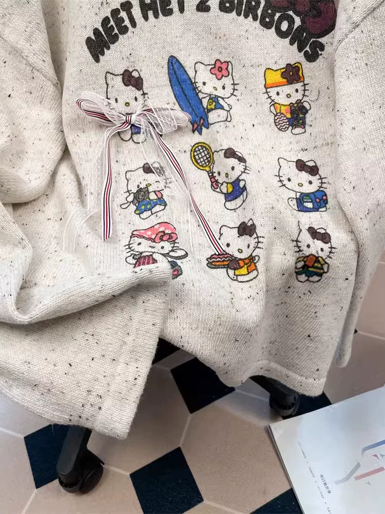 Áo len trễ vai hình mèo KT dễ thương và sành điệu dành cho nữ, phong cách mùa thu Hàn Quốc, áo dệt kim ngọt ngào và trẻ trung