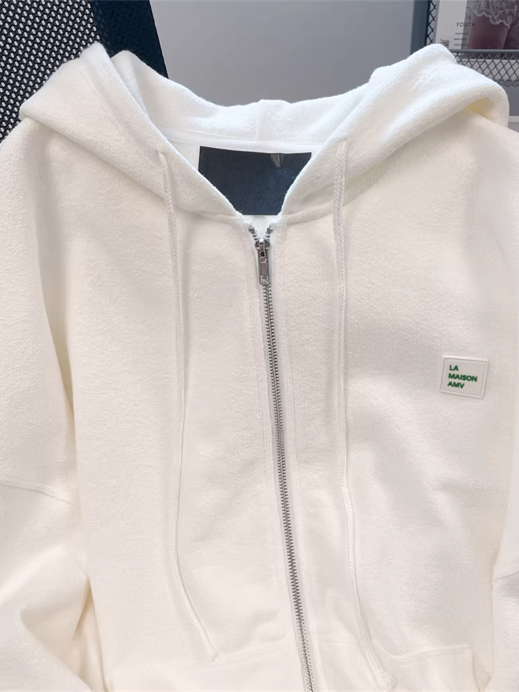 Áo khoác có mũ trùm đầu dáng rộng kiểu Mỹ màu trắng dành cho nữ, mặc cặp đôi mùa thu đông, áo thiết kế đơn giản giản dị.