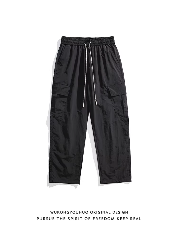 Wukong có sẵn quần thể thao nam kiểu Nhật cổ điển nhiều túi, có dây rút, chất liệu thun, kiểu dáng thời trang, rộng rãi, đa năng, phong cách thường ngày.