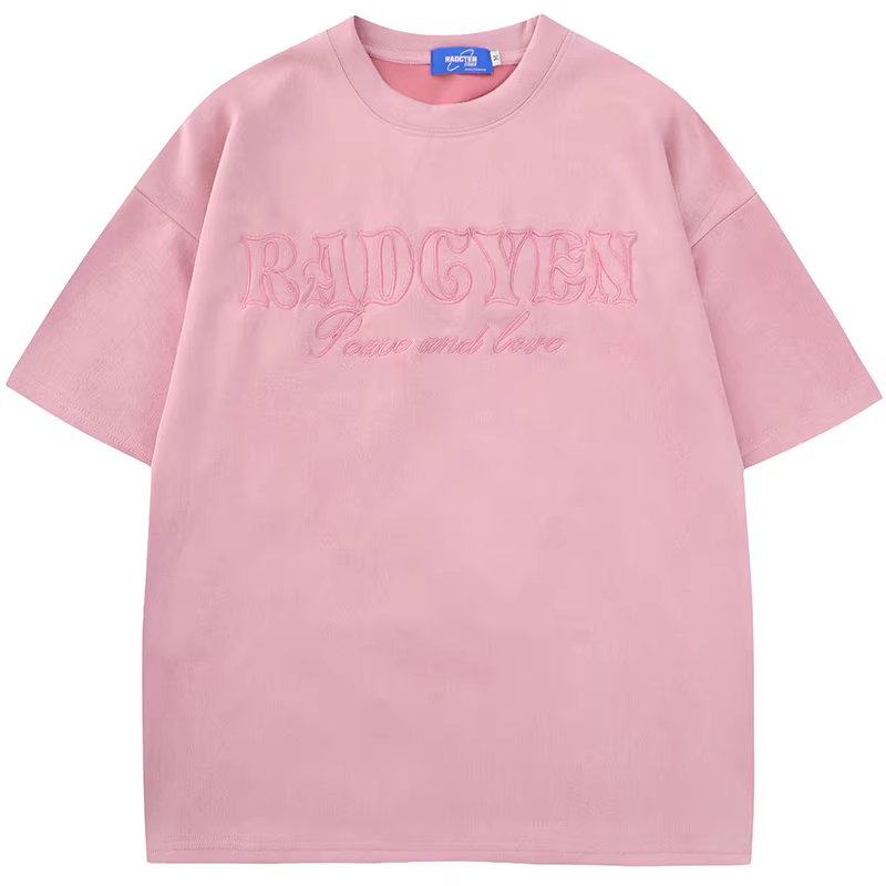 Wukong có sẵn áo thun ngắn tay da lộn thêu hình trái tim gai phong cách Mỹ dành cho nam, áo thun cặp đôi màu hồng dáng rộng cổ điển.