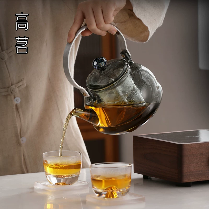 Ấm trà thủy tinh cao cấp hình bầu trời đầy sao với hệ thống nấu và pha trà tích hợp phun hơi nước, bếp điện gốm chuyên dụng, chịu nhiệt.