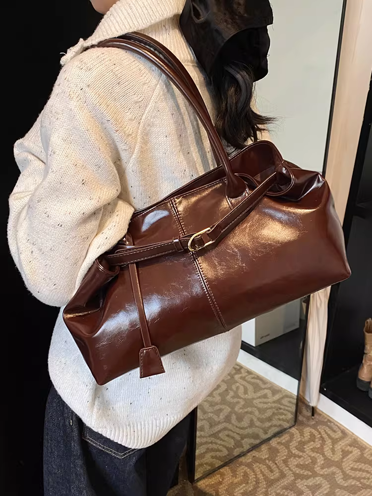 Túi đeo chéo nữ retro, dung tích lớn, mẫu mới thu đông 2025, thiết kế độc đáo, đeo vai/nách, phong cách thường ngày, thích hợp đi làm và phối đồ công sở.