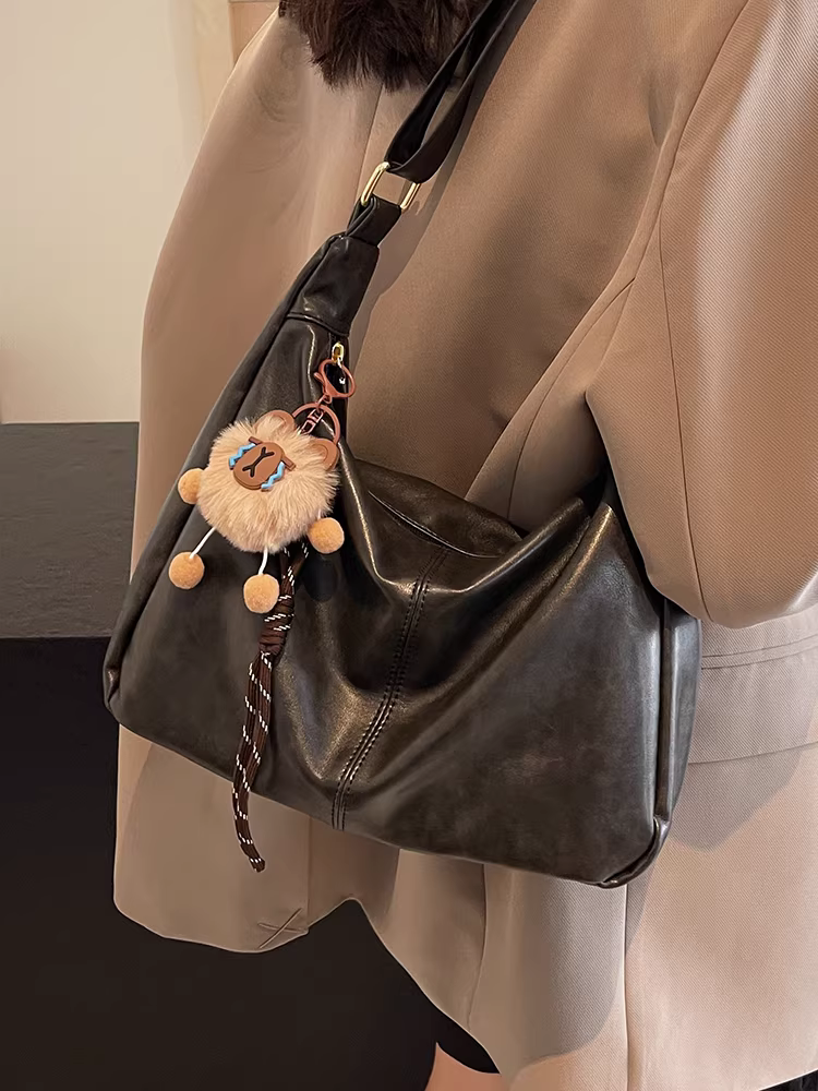 Túi xách nữ cỡ lớn, kiểu mới thu đông 2025, đa năng, đơn giản, đeo vai/chéo, phong cách retro giản dị, thích hợp đi làm.