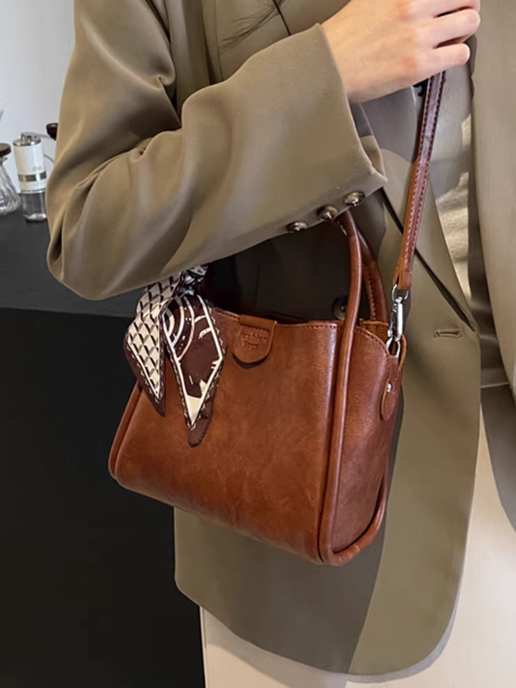 Túi xách nữ kiểu mới 2025, túi đeo vai dáng xô thời thượng, thiết kế độc đáo, đeo chéo, cầm tay, thích hợp đi làm, túi tote nhỏ