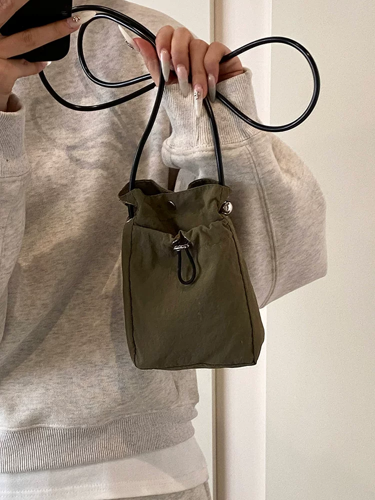 Túi điện thoại vải canvas nữ, đeo chéo, kiểu mới 2025, đa năng, thiết kế độc đáo, ví đựng tiền xu đeo vai đơn, túi nhỏ cao cấp.