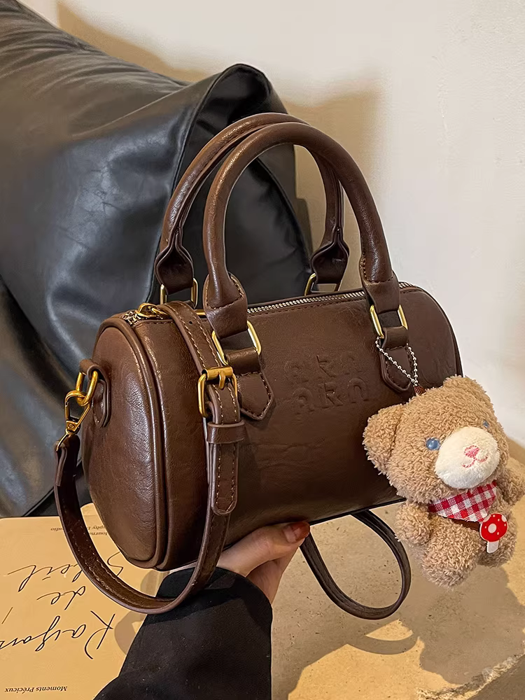 Túi xách thiết kế độc đáo dành cho nữ, thời trang thu đông 2025, kiểu dáng retro, đeo chéo một bên vai, túi trụ cao cấp cầm tay