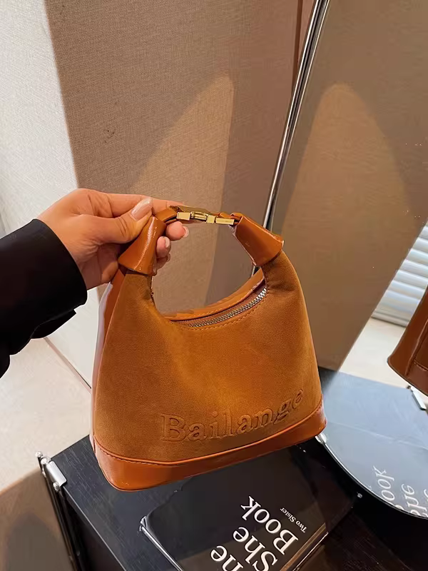 Túi da lộn nữ, mẫu mới thu đông 2025, thiết kế độc đáo, phong cách retro, túi đeo chéo thời thượng, túi bánh bao