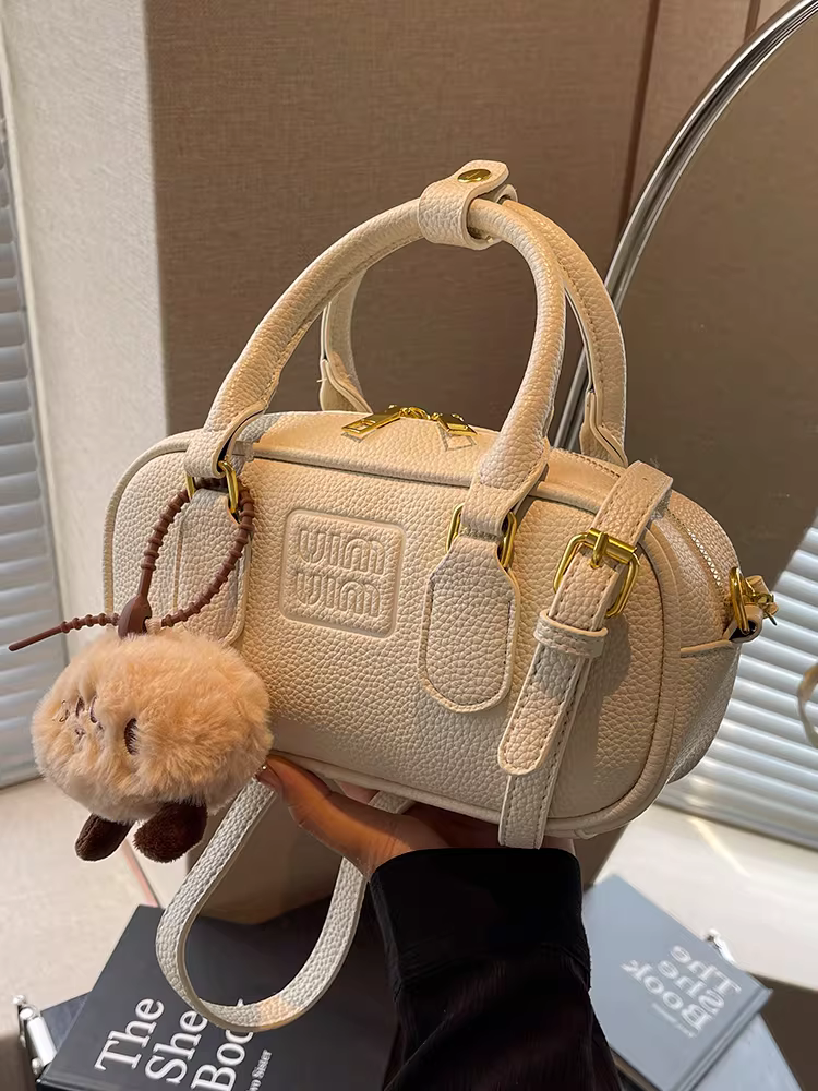 Túi nhỏ siêu hot dành cho nữ, đa năng cho mùa thu đông 2025, túi bowling đeo chéo retro mới, túi xách nữ đi làm.