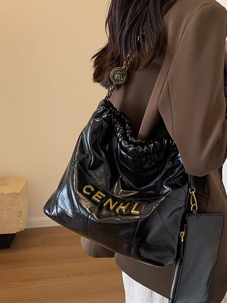 Túi xách nữ cỡ lớn thời trang mới 2025, kiểu đeo chéo, dáng xô, chất liệu có vân, đa năng, thích hợp đi làm