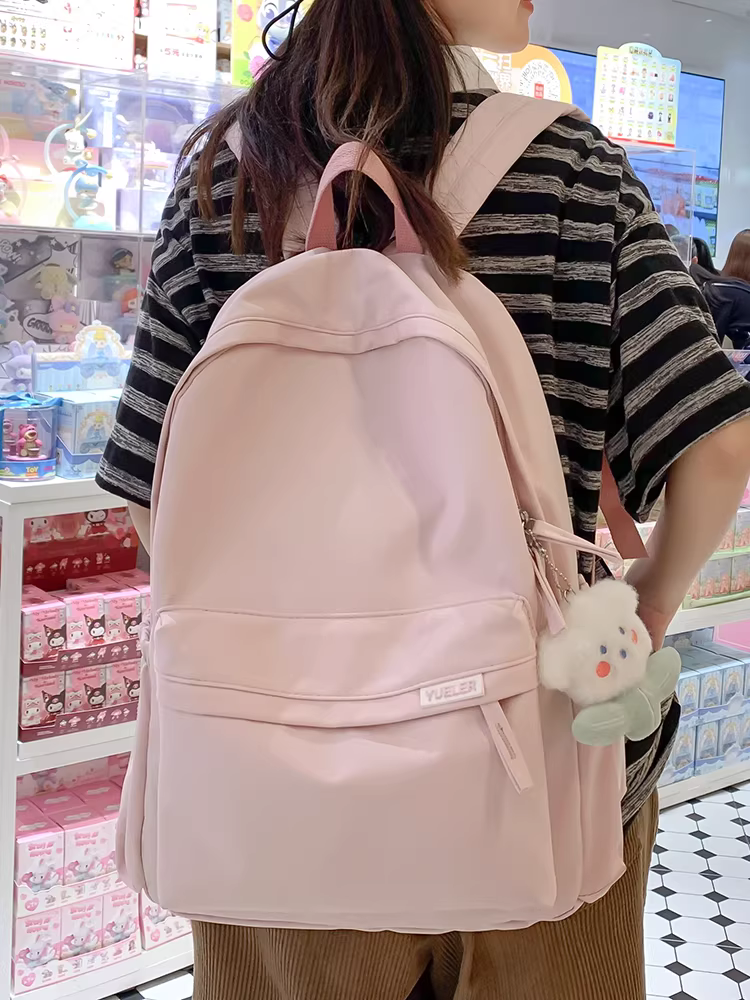 Túi xách dung tích lớn 2025 kiểu mới ba lô nữ túi học sinh cấp hai và cấp ba ba lô cao cấp đơn giản đa năng