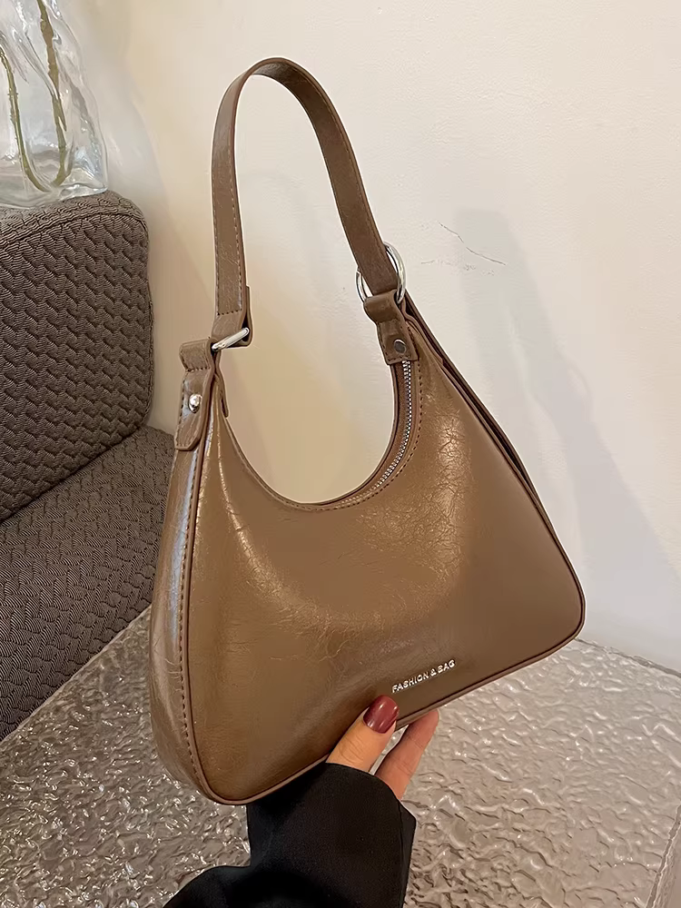 Túi đeo nách nữ 2025 kiểu mới cao cấp thời trang đa năng thiết kế độc đáo hot trend mạng xã hội bán chạy