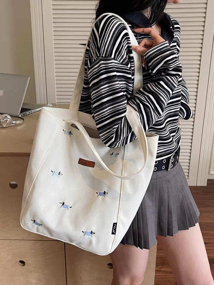 Túi vải thêu dành cho nữ, sức chứa lớn, mẫu mới hè 2025, túi đeo vai đa năng, phong cách thường ngày, túi tote dành cho sinh viên đi học.