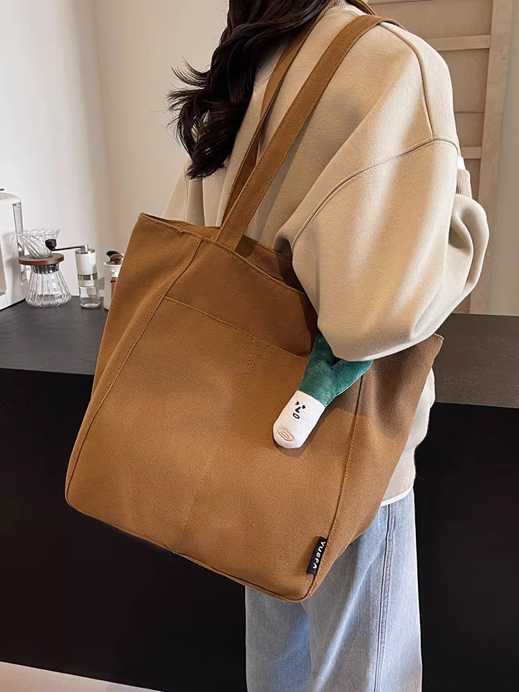 Túi vải canvas nữ, dung tích lớn, mẫu mới thu đông 2025, túi đeo vai đa năng, phong cách thường ngày, thích hợp đi học, đi làm