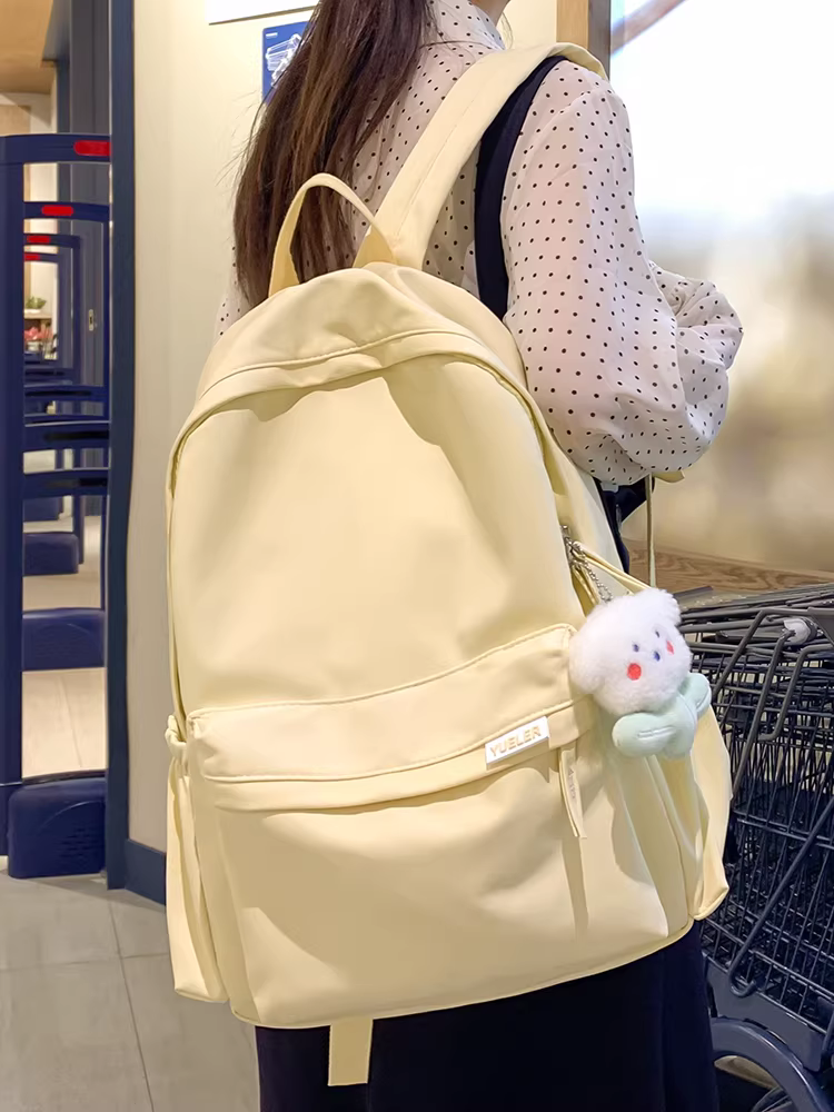 Túi xách dung tích lớn 2025 kiểu mới ba lô nữ túi học sinh cấp hai và cấp ba ba lô cao cấp đơn giản đa năng
