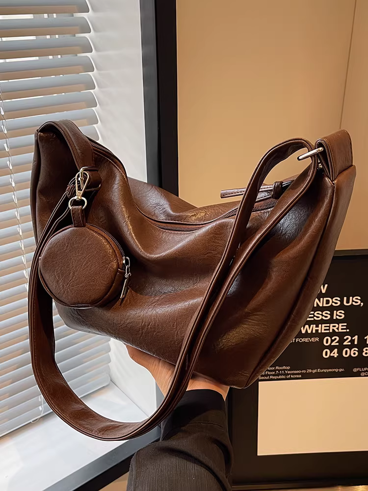 Túi xách nữ đa năng dung tích lớn thiết kế cao cấp độc đáo năm 2025, dây đeo rộng, đeo chéo, kiểu dáng bánh bao, phong cách thường ngày