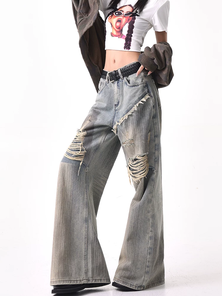 KEN STUDIO mùa thu đông phong cách mới màu xanh lam hai lớp rách giả hai mảnh quần jean nối liền quần ống rộng thẳng dành cho nữ