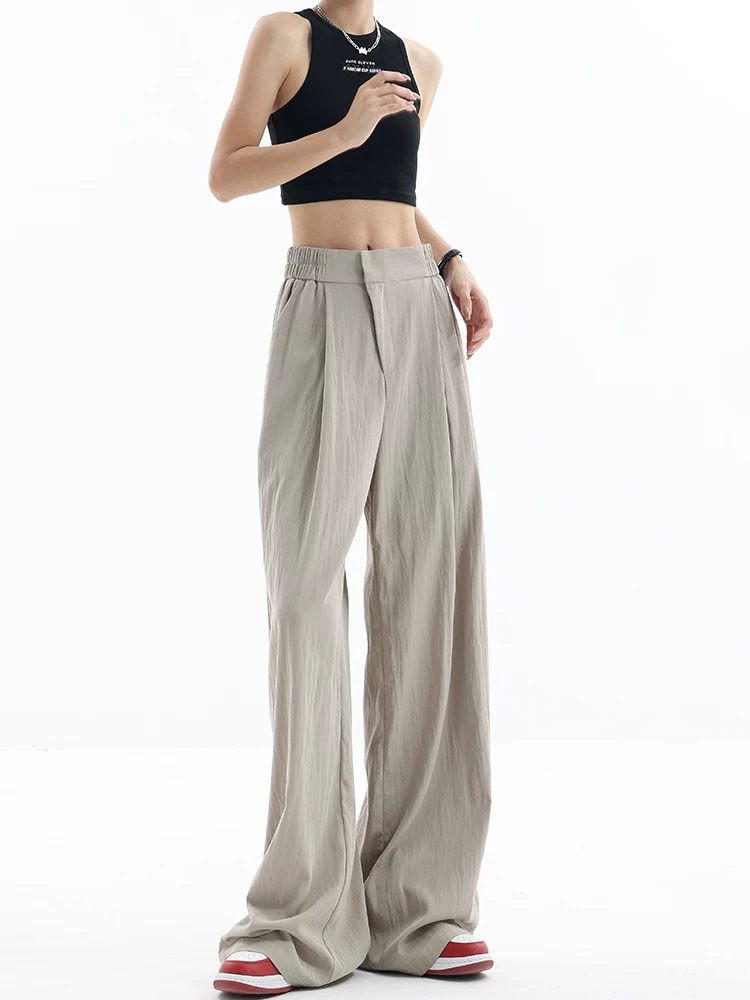 Quần dài lụa băng siêu mềm mùa hè của KEN STUDIO dành cho nữ với thiết kế lưng thun, quần ống rộng dáng rộng
